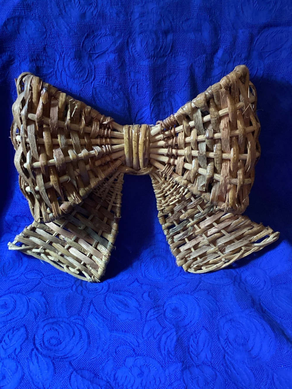 Vintage Rustic Rattan and Wicker Bow Wall Hanging Decor. Old and Unique.